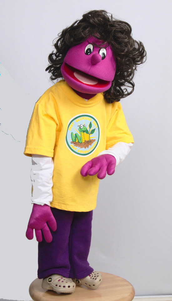A puppet in a worm-themed yellow shirt