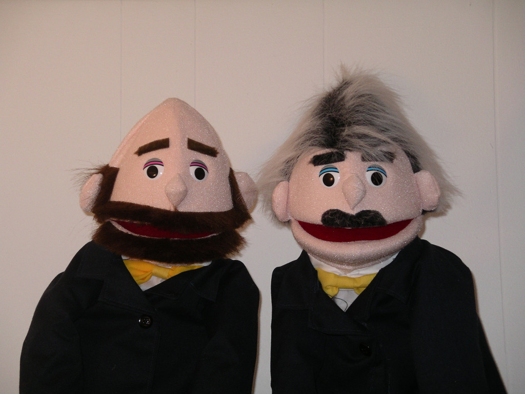 Two commentator puppets