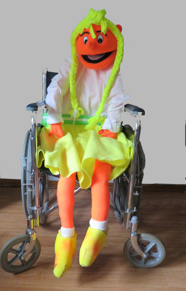 The Zoe puppet (in a wheelchair)