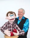 Mr. T and his puppet holding two apples