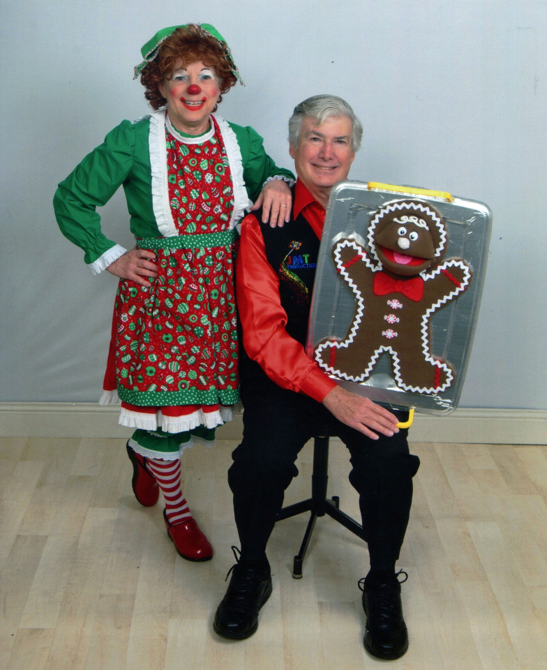 Rainbow the Clown and Mr. T with a gingerbread person