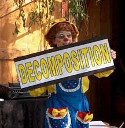 Rainbow holds a sign that says "decomposition"