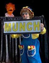 Rainbow holds a sign that says "munch"