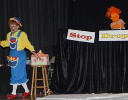Rainbow and a puppet teach "stop, drop, roll"