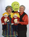 Rainbow the Clown and Mr. T with three puppets